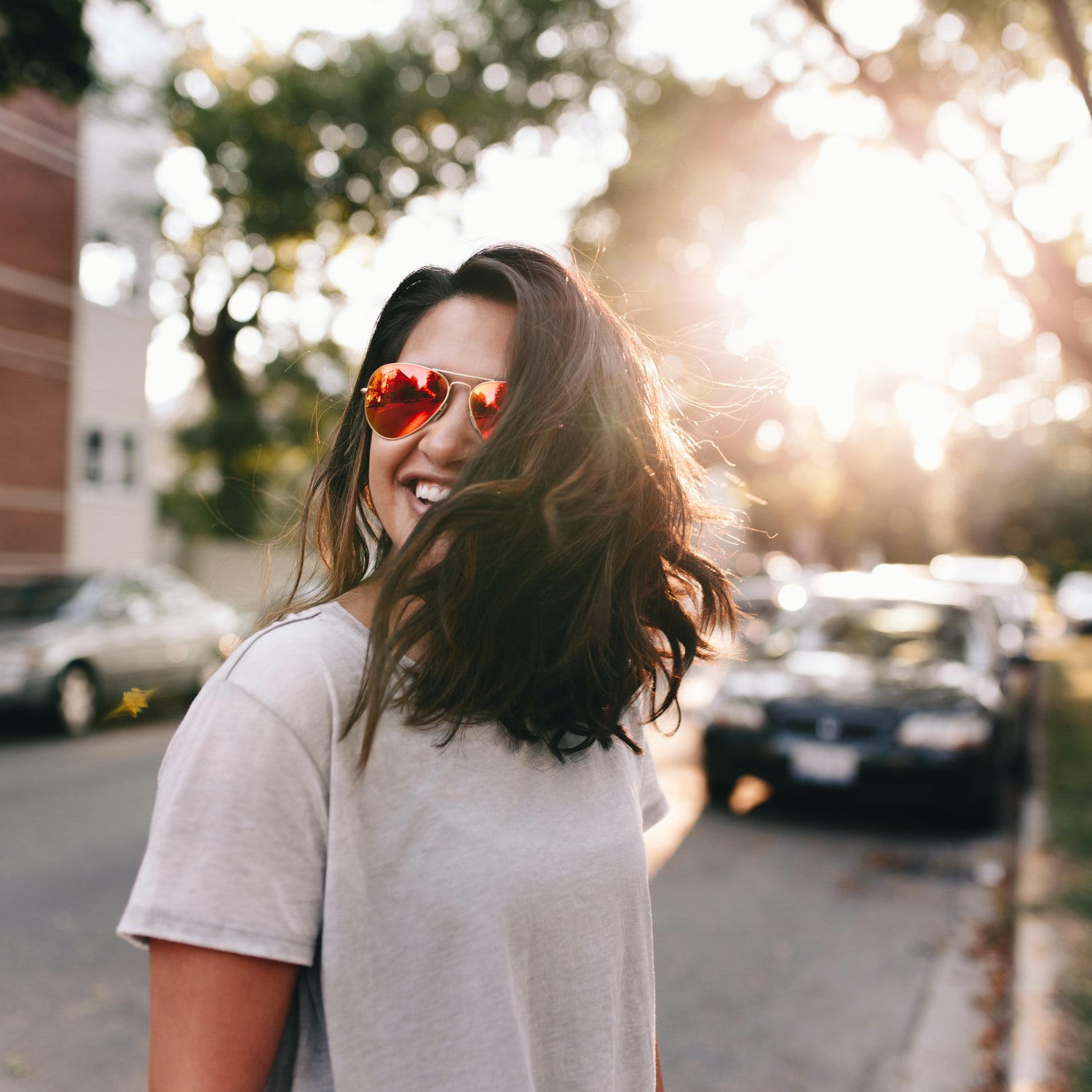 Girl Smiling in Street